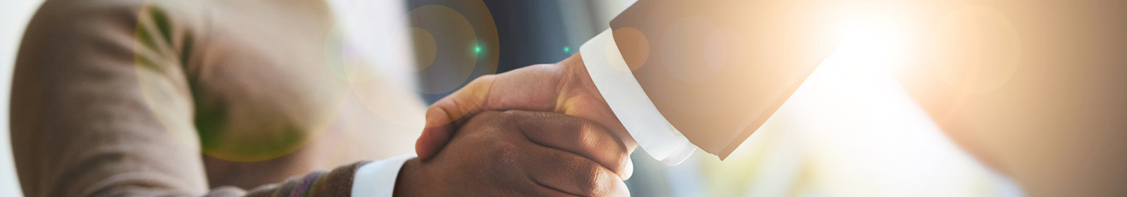 two men shaking hands